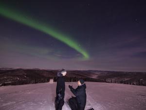 She said yes! Proposal under the Northern Lights Photo